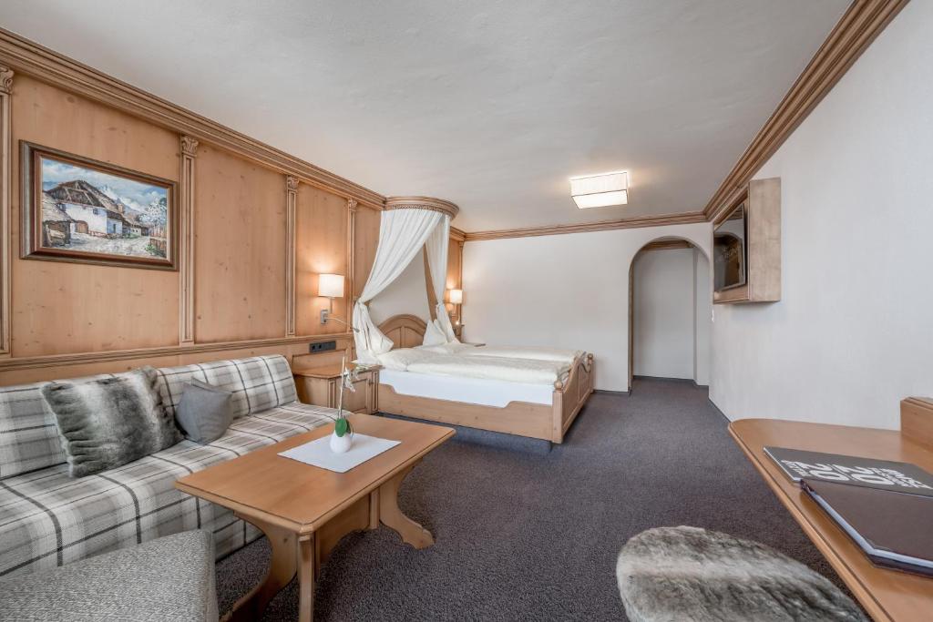 Postel nebo postele na pokoji v ubytování Hotel Regina