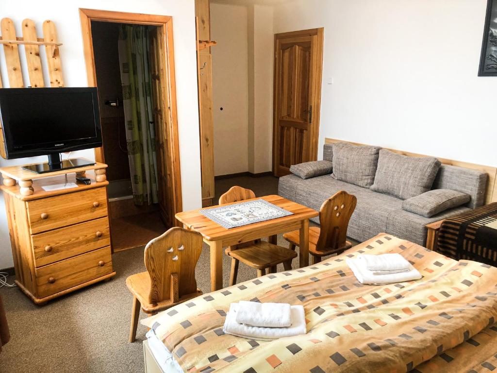 Postel nebo postele na pokoji v ubytování Privat u Babky