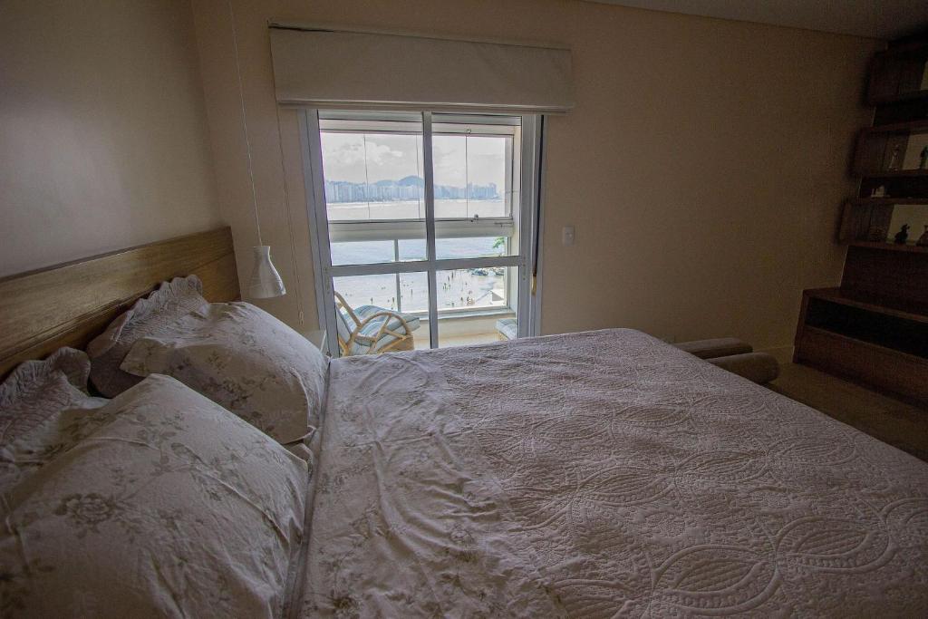  Apartamento Les Vagues - Alto estilo de frente para o mar no Guarujá