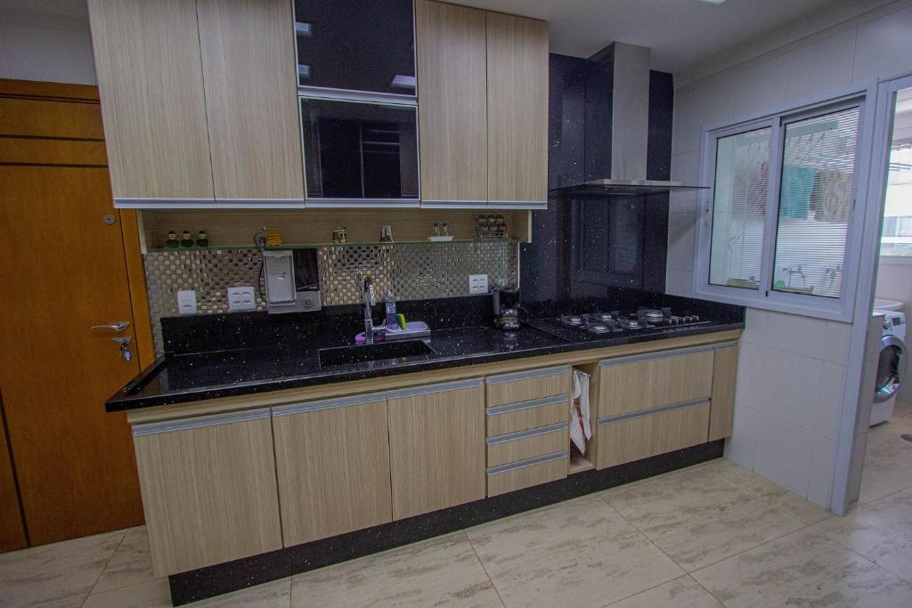  Apartamento Les Vagues - Alto estilo de frente para o mar no Guarujá