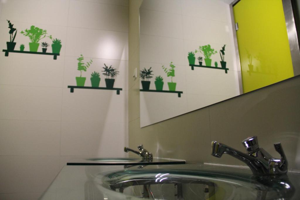 Kúpeľňa v ubytovaní Sleep Green - Certified Eco Youth Hostel