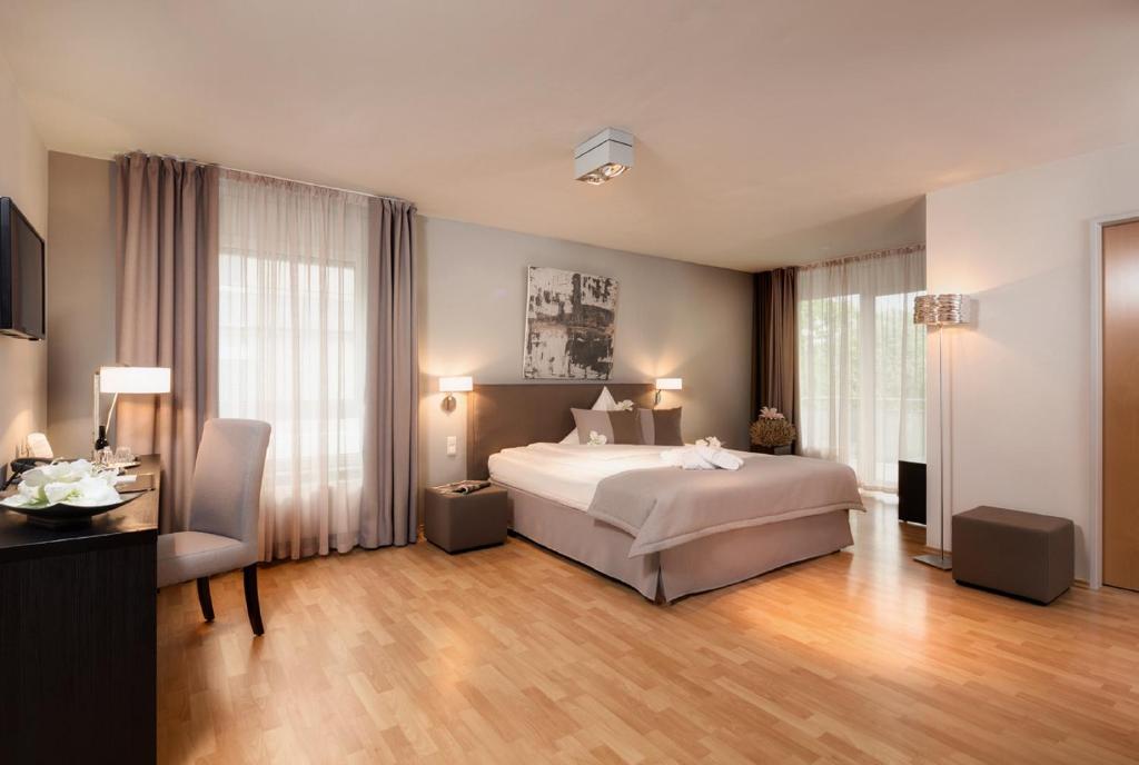 Postel nebo postele na pokoji v ubytování Art Hotel Superior