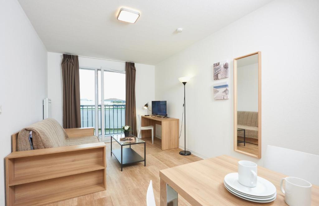 Posezení v ubytování Ténéo Apparthotel Talence - Centre