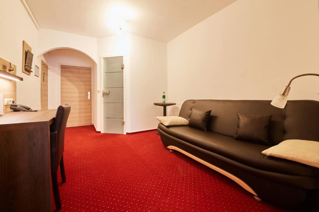 Posezení v ubytování Hotel Schoos