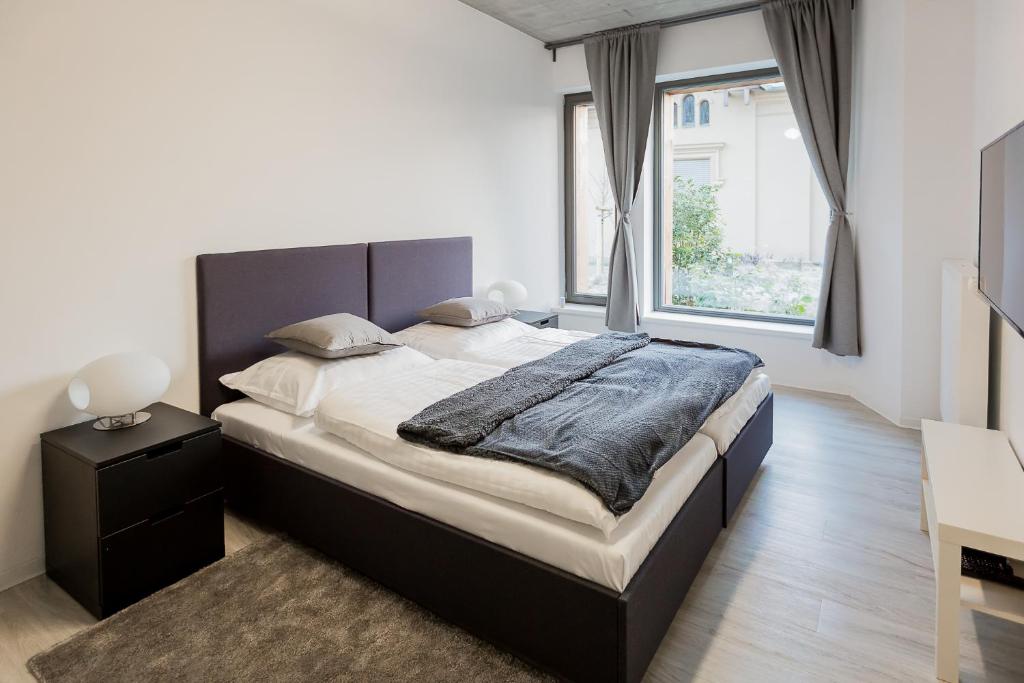 Postel nebo postele na pokoji v ubytování Exclusive penzion Viva Residence