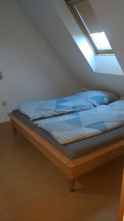 Postel nebo postele na pokoji v ubytování Ostseesonne