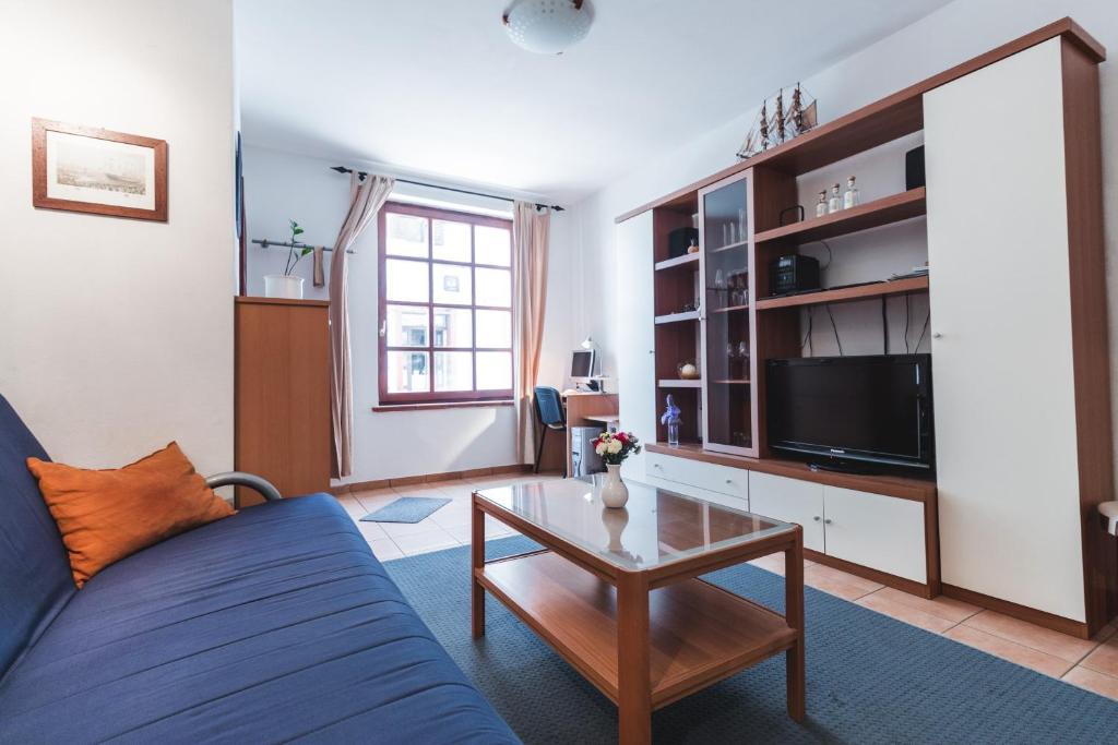 TV a/nebo společenská místnost v ubytování Apartments Pri Mari