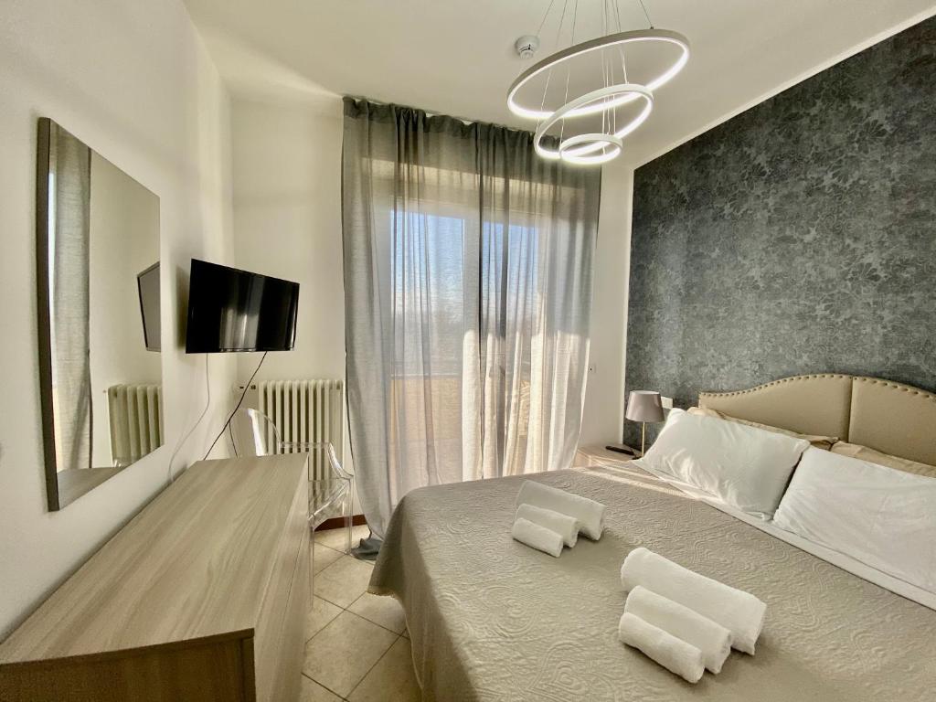 Ένα ή περισσότερα κρεβάτια σε δωμάτιο στο Residence Cima