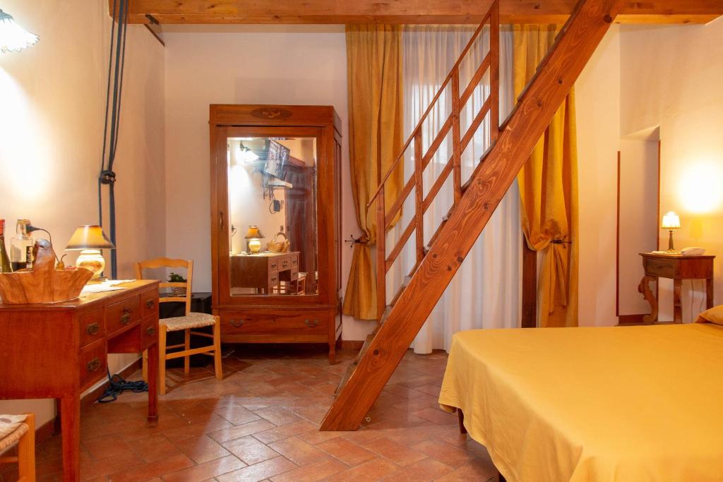Postel nebo postele na pokoji v ubytování Donnaciccina Accomodation