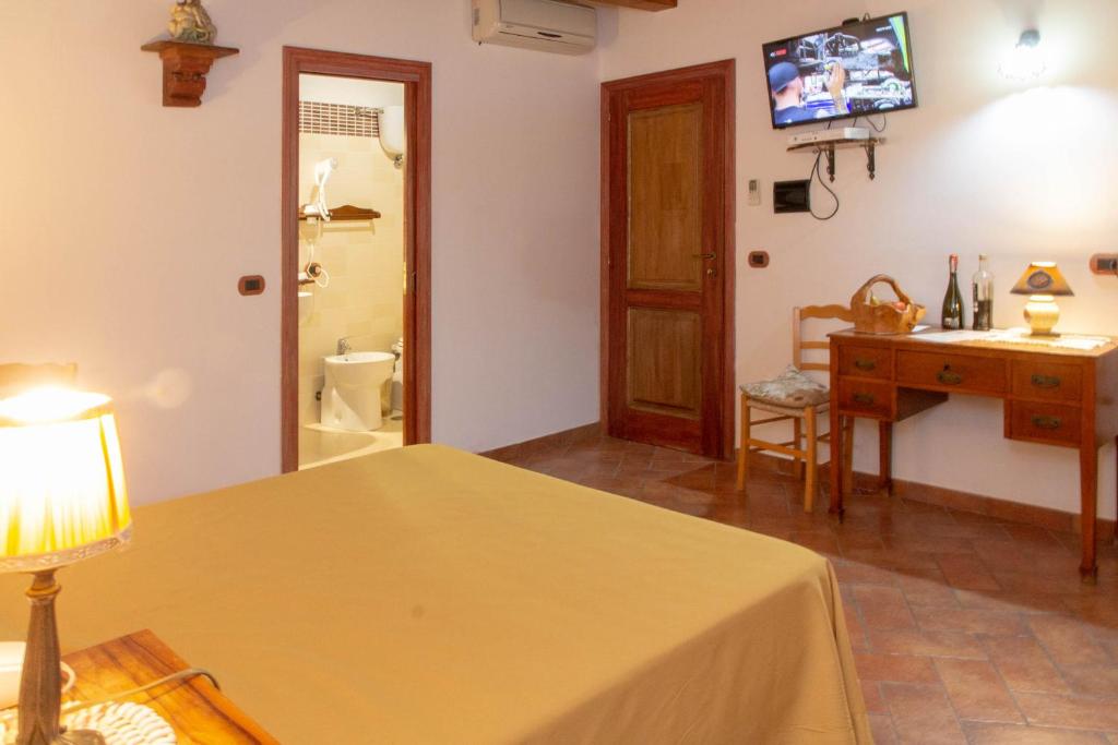 TV a/nebo společenská místnost v ubytování Donnaciccina Accomodation