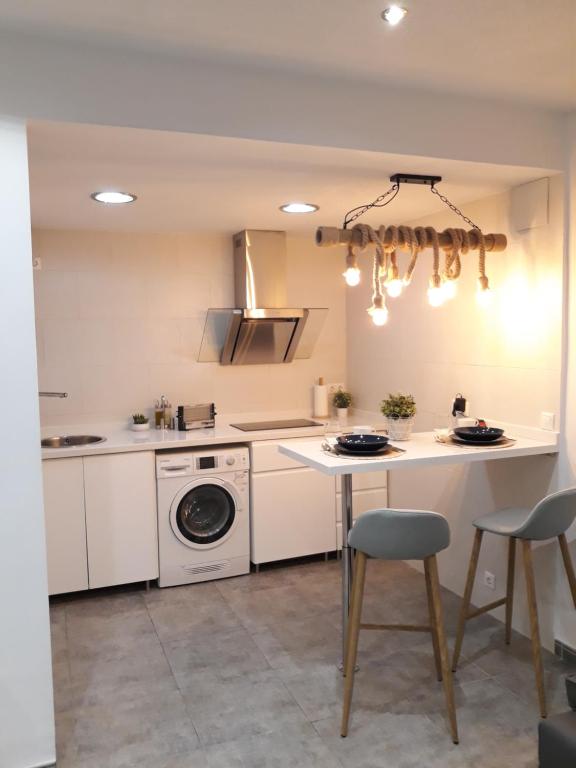 Kuchyň nebo kuchyňský kout v ubytování Apartamento pleno centro Wallada