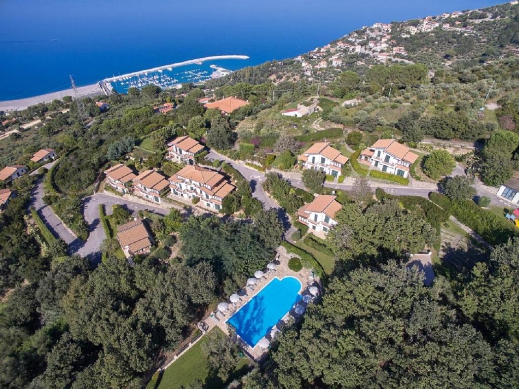 an aerial view of a house on a hill near the water at Residence Galati in Capo dʼOrlando