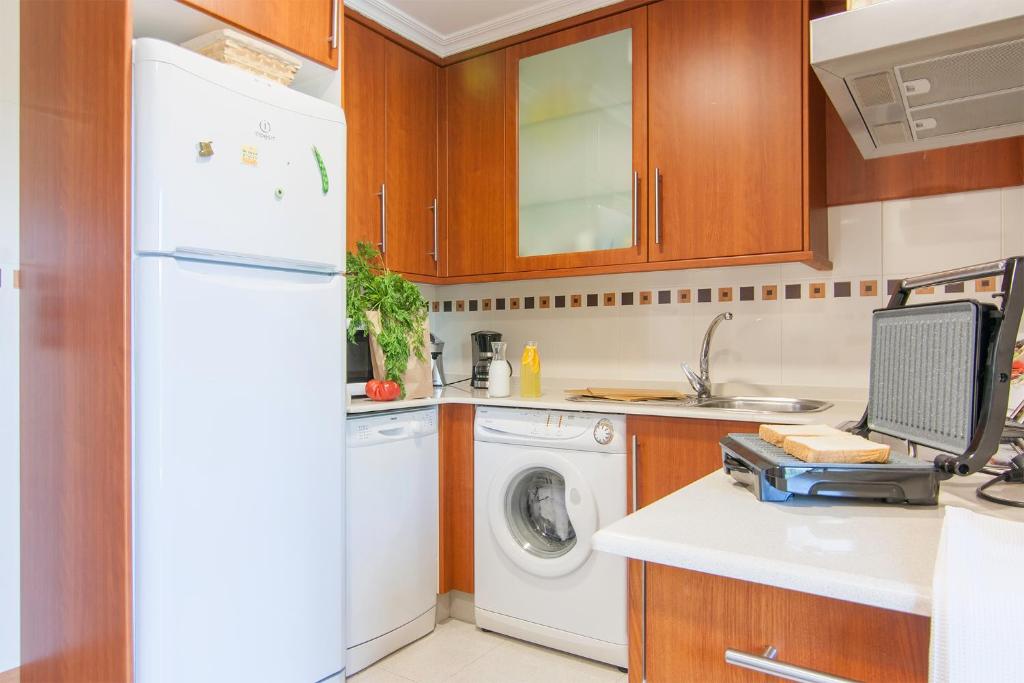 Kuchyňa alebo kuchynka v ubytovaní Residencial Vicaño VUT-PO-03856