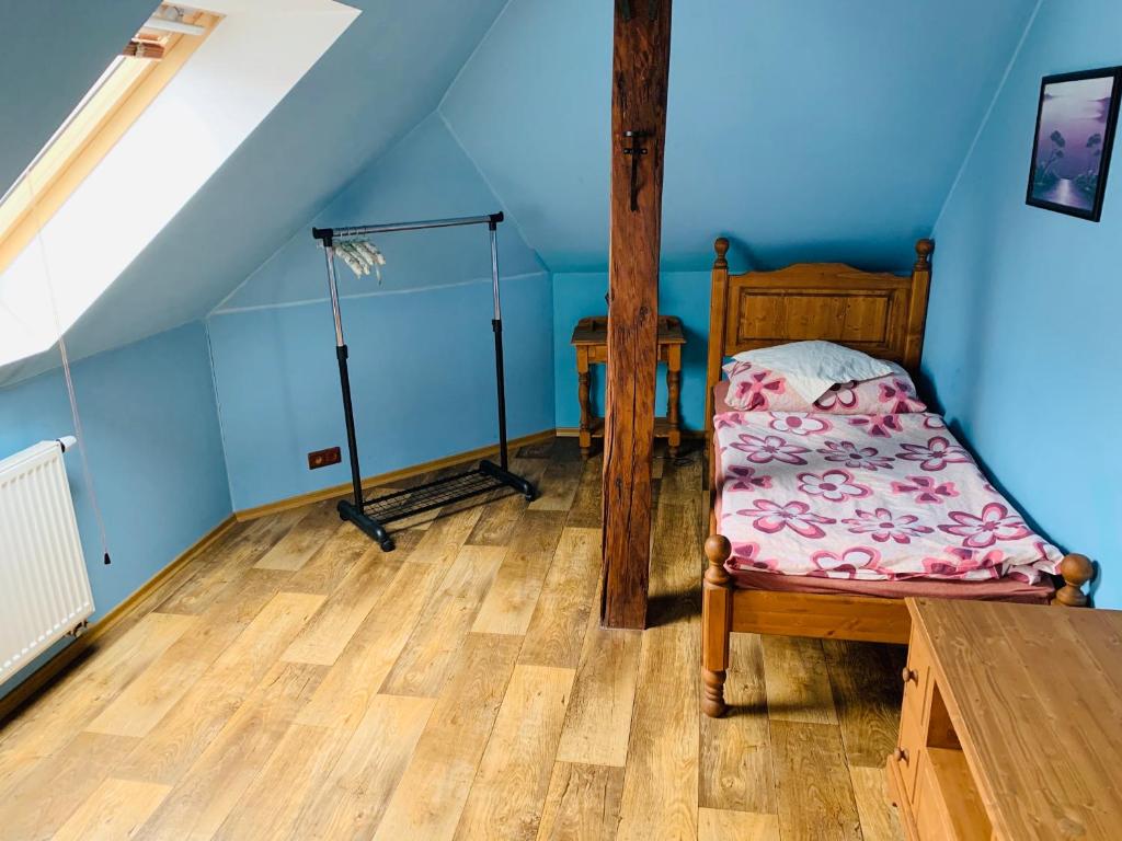 Postel nebo postele na pokoji v ubytování Penzion Na Růžku