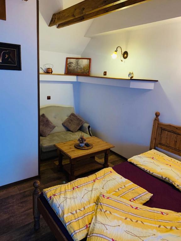 Postel nebo postele na pokoji v ubytování Penzion Na Růžku