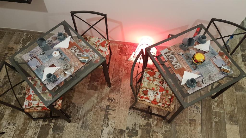 an overhead view of two tables in a room at THAT'S AMORE FIUMICINO Airport in Fiumicino