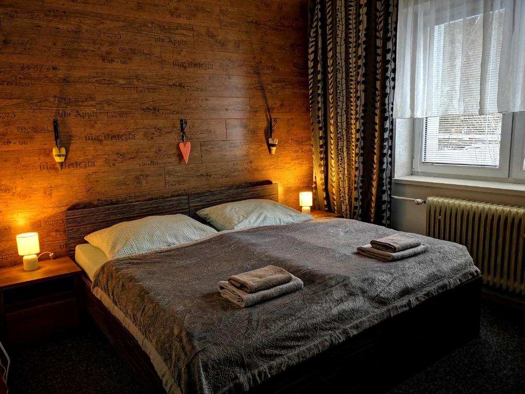 Letto o letti in una camera di Penzion Zázrifka