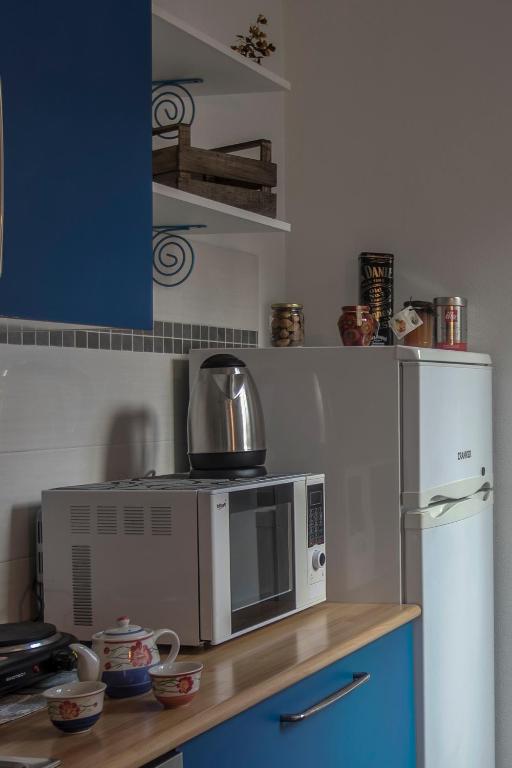 Kuchyň nebo kuchyňský kout v ubytování Lisetta Rooms