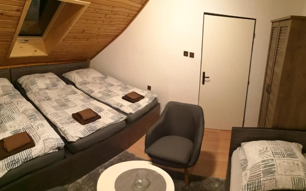 Letto o letti in una camera di Penzion Zázrifka