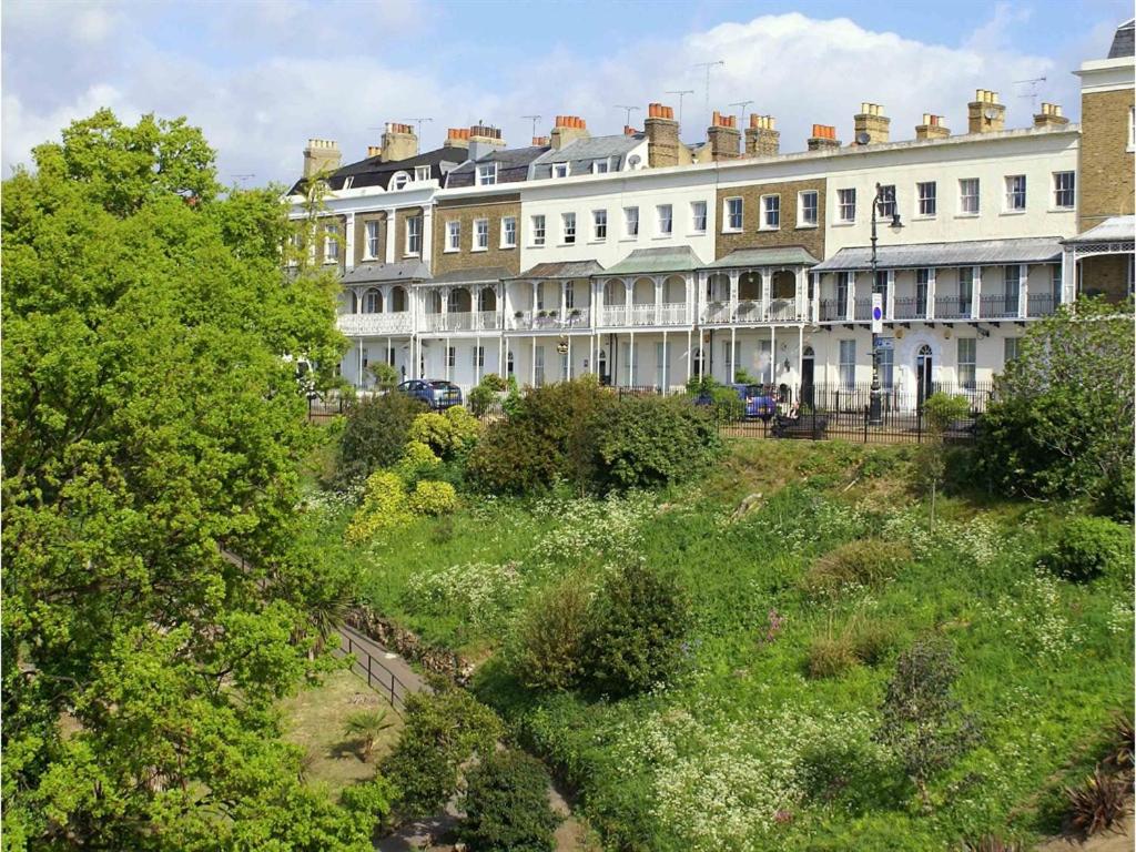 a row of large white buildings in a city at Hamiltons Boutique Hotel in Southend-on-Sea