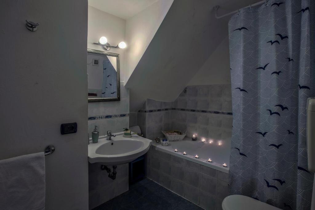 Koupelna v ubytování Lisetta Rooms