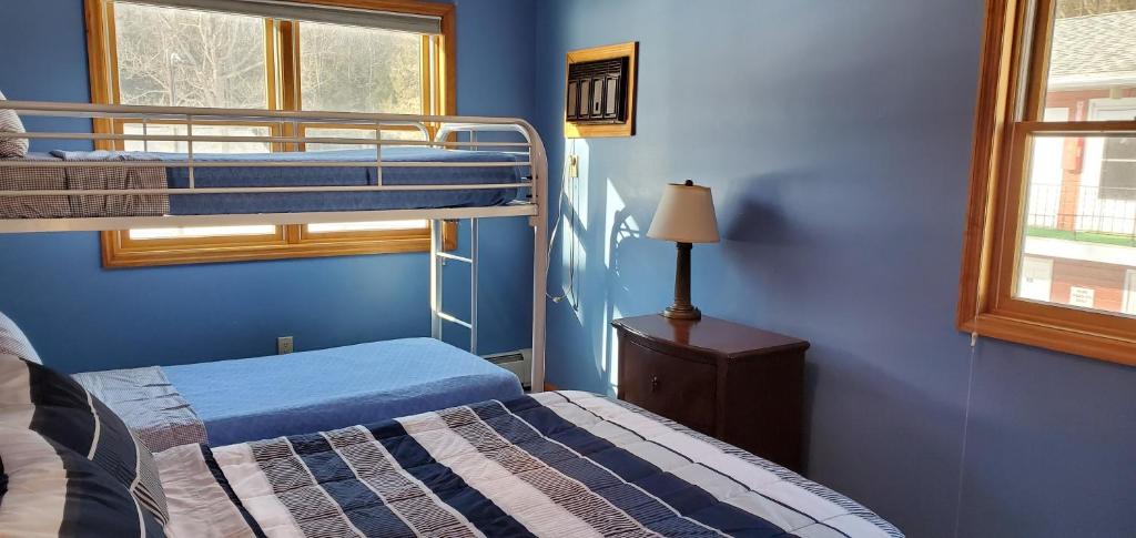 Postel nebo postele na pokoji v ubytování Red Ranch Inn