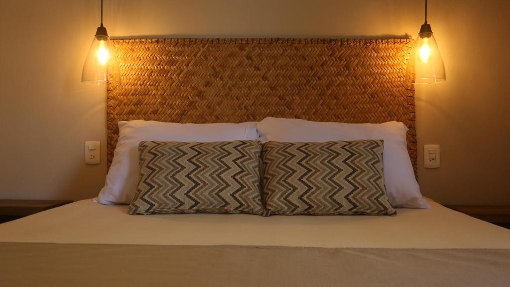 Postel nebo postele na pokoji v ubytování Agam Hotel
