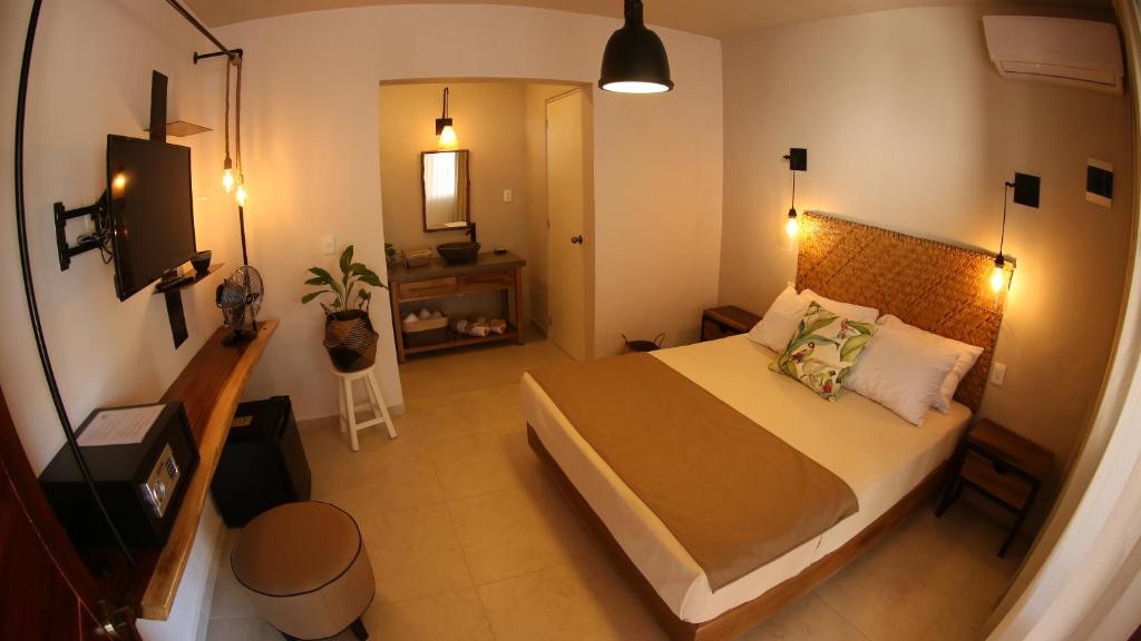 Postel nebo postele na pokoji v ubytování Agam Hotel