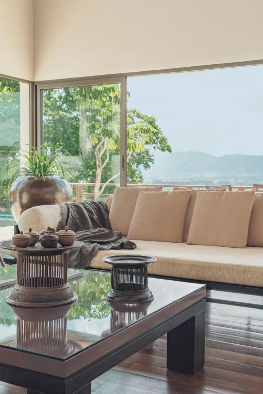 Posezení v ubytování The Pavilions Phuket