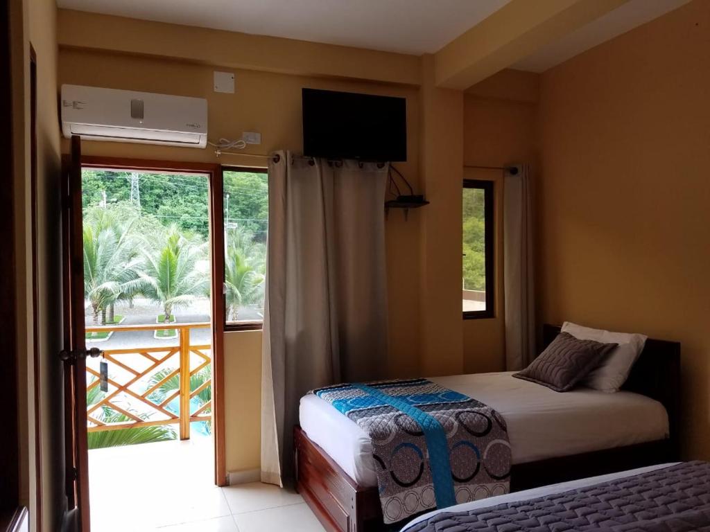 Postel nebo postele na pokoji v ubytování Hotel Soberao