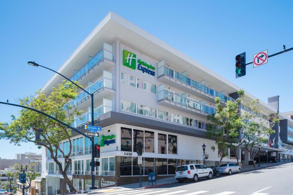 a rendering of a hotel on a street corner at Holiday Inn Express - Downtown San Diego, an IHG Hotel in San Diego