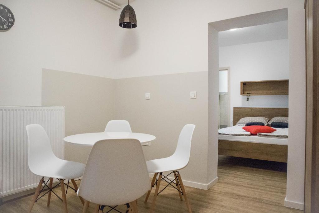 Postel nebo postele na pokoji v ubytování Jantar Apartmaji