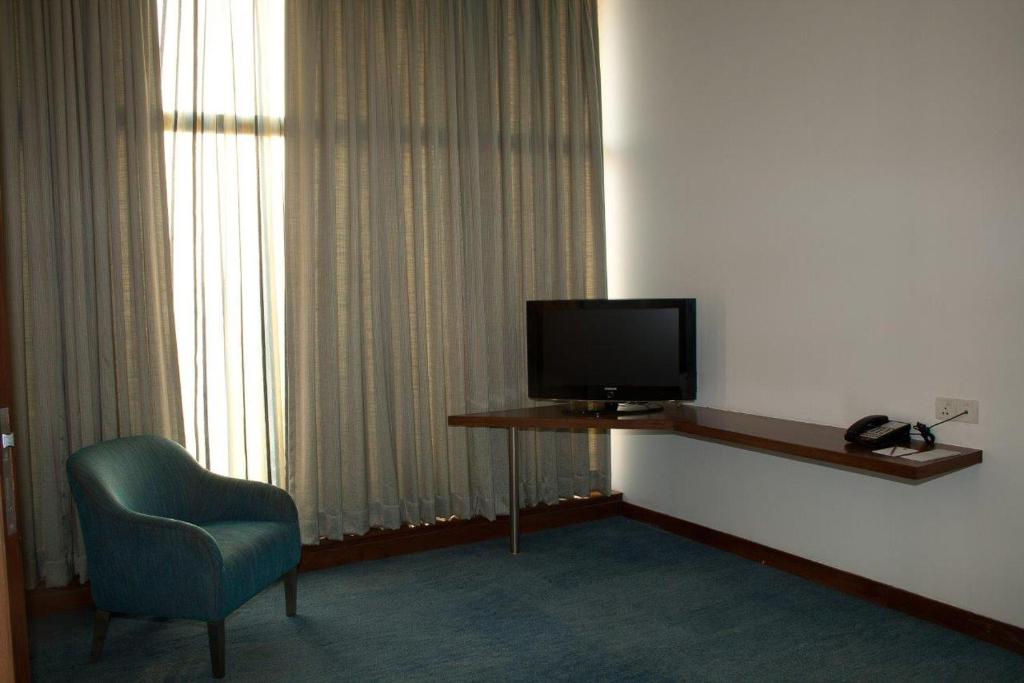 TV a/nebo společenská místnost v ubytování Hotel Parc Estique
