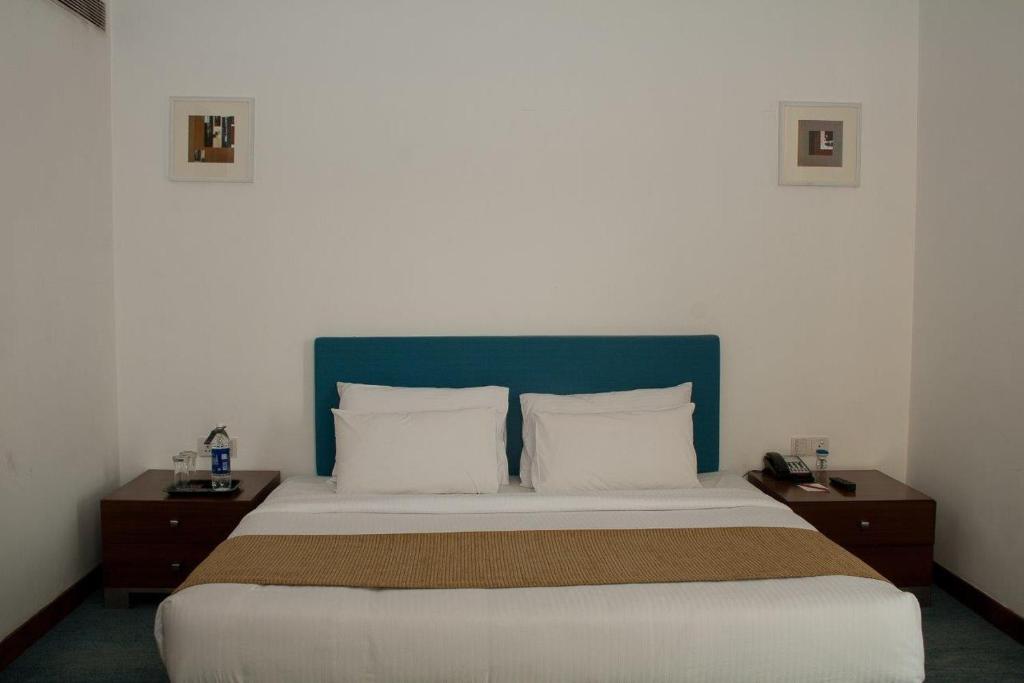 Postel nebo postele na pokoji v ubytování Hotel Parc Estique
