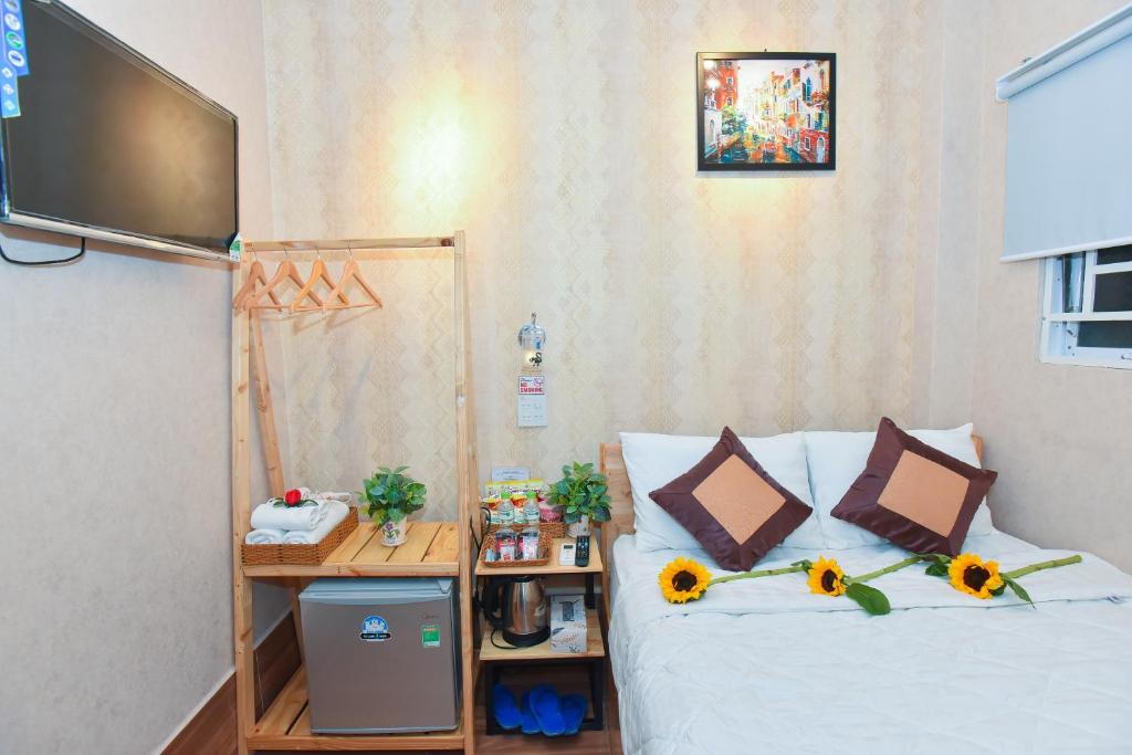 TV a/nebo společenská místnost v ubytování Winny Hotel Ninh Kieu Quay