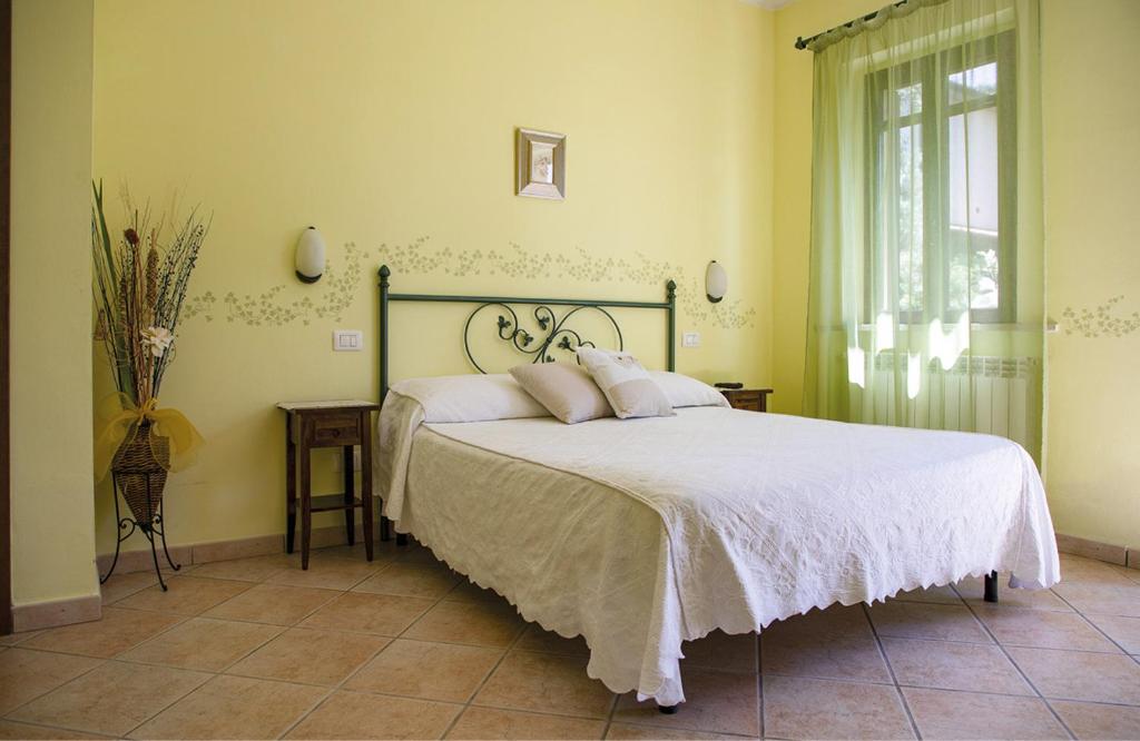 Katil atau katil-katil dalam bilik di Agriturismo I Tre Fossi