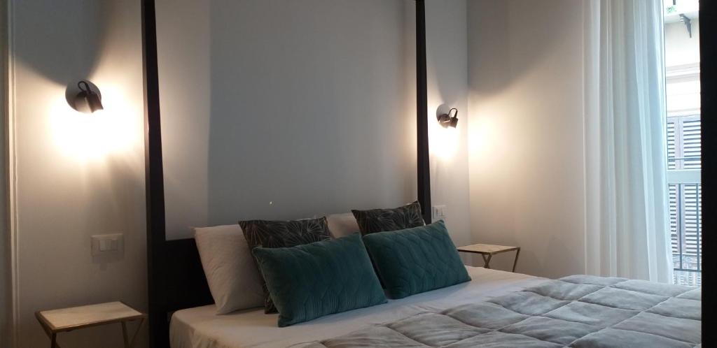 Postel nebo postele na pokoji v ubytování Il Rosone Luxury B&B