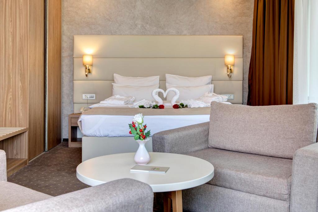 Postel nebo postele na pokoji v ubytování Hotel Eden