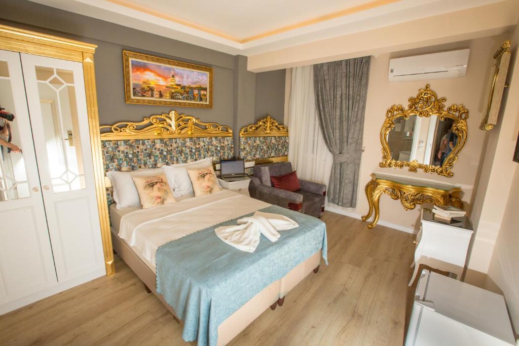Atlantis Royal Hotelにあるベッド