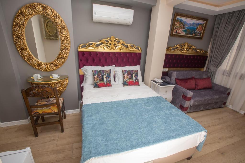 Atlantis Royal Hotelにあるベッド