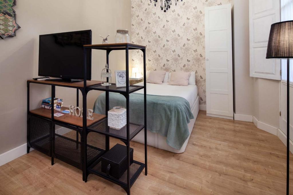 Postel nebo postele na pokoji v ubytování Valentina Home