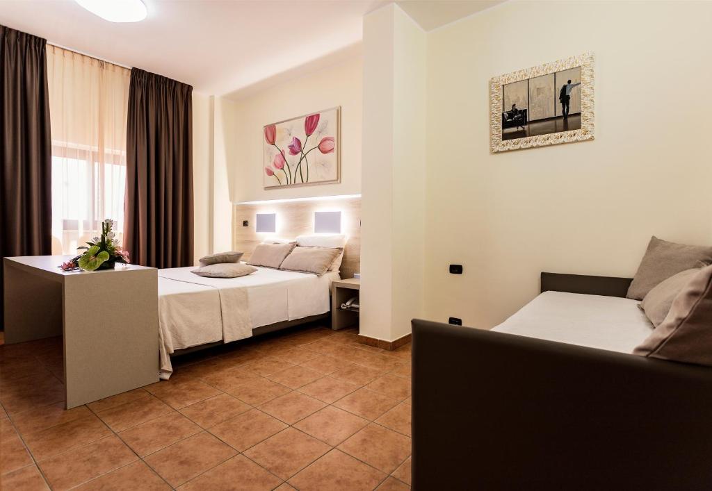 Postel nebo postele na pokoji v ubytování Hotel Fly