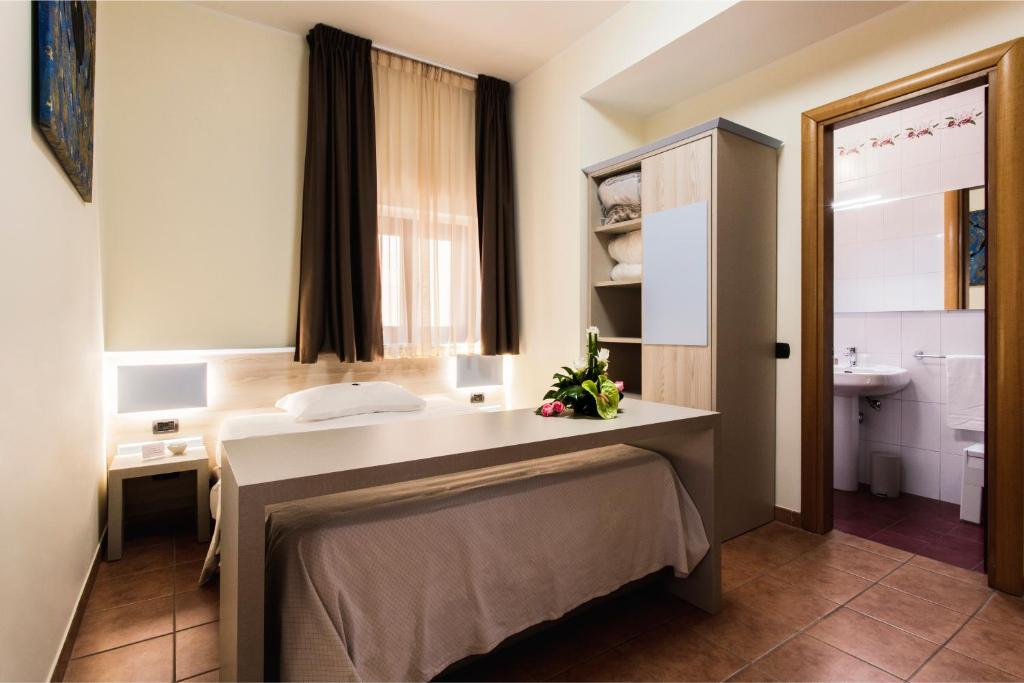 Postel nebo postele na pokoji v ubytování Hotel Fly