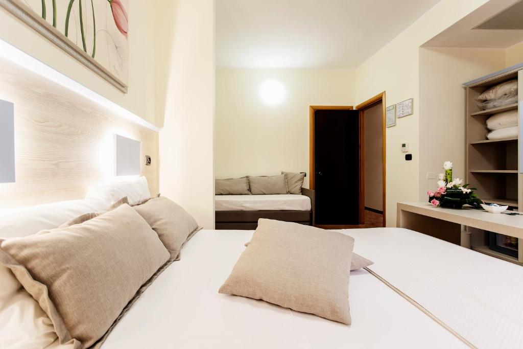 Postel nebo postele na pokoji v ubytování Hotel Fly
