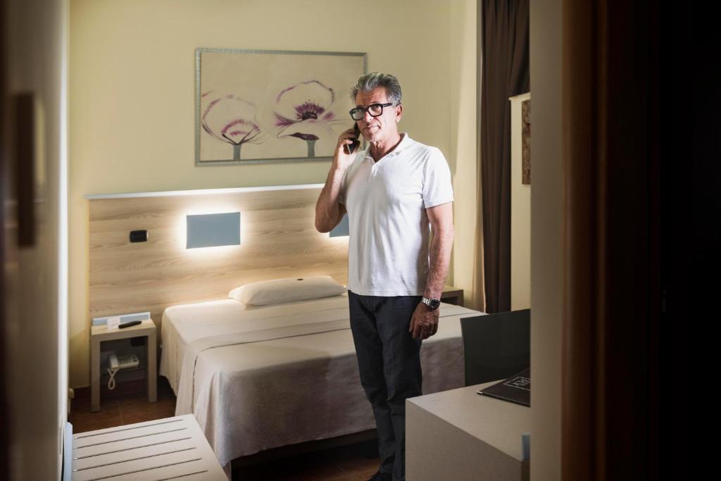 Postel nebo postele na pokoji v ubytování Hotel Fly
