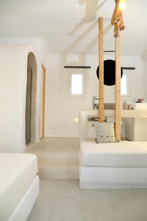Postel nebo postele na pokoji v ubytování Irida Vacation suites