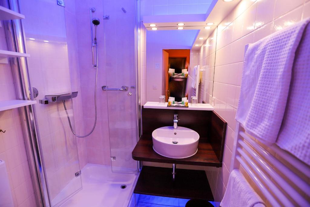 Koupelna v ubytování Hotel Modena