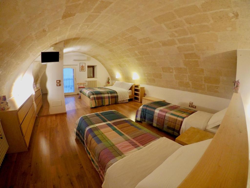 Postel nebo postele na pokoji v ubytování Casa SantoStefano
