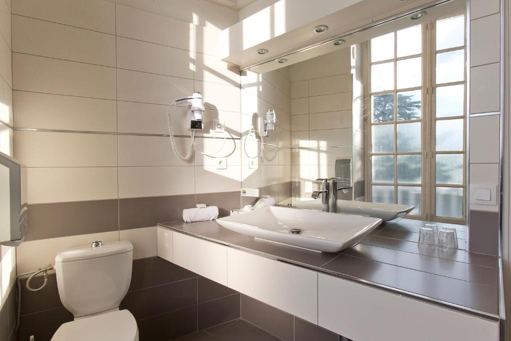 Koupelna v ubytování Château & Spa De La Commanderie