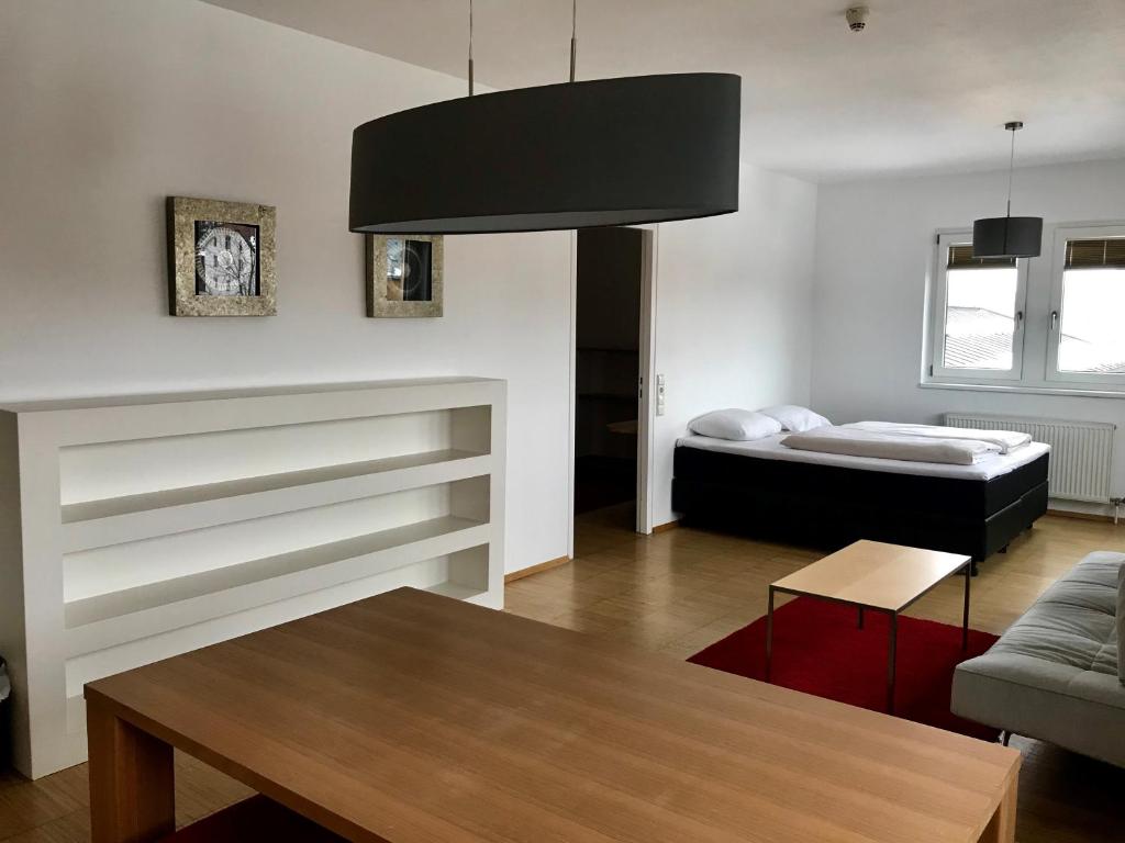 Postel nebo postele na pokoji v ubytování Parkhotel Hall in Tirol